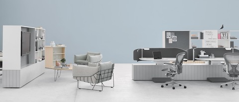 Locale elements divide space in a collaboration area that includes light grey Aeron office chairs and Wireframe lounge chairs.