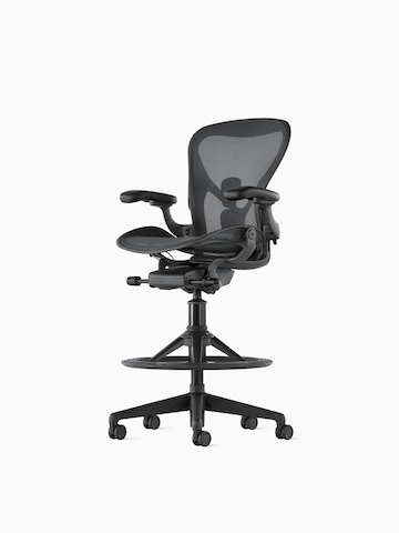 Black Aeron Stool on a white background, with a 5-star base and ergonomic back support, viewed from the front. Select to view the Aeron Stool product page.