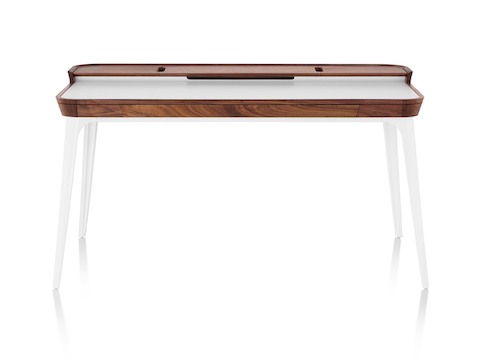 Front view of an Airia Desk in white with dark wood trim and white legs.