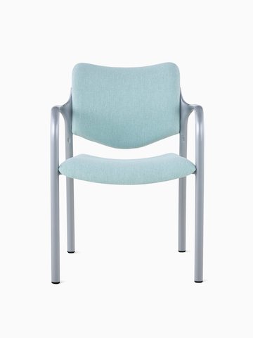 An Aside Chair with light green upholstered seat and back, viewed from the front.