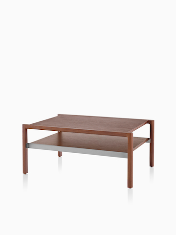 Una mesa rectangular Brabo con un acabado de madera medio. Seleccione para ir a la página del producto Brabo Tables.