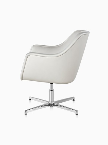 White leather Bumper Chair with a four-star base, viewed from the side.