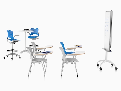 Blue Caper Multipurpose Stools around a standing height table and four Caper stacking chairs with tablet arms, facing a mobile easel.