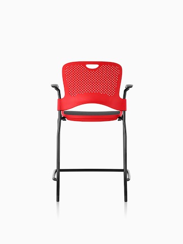 Red counter-height Caper Stacking Stool with a black suspension seat, viewed from the rear.