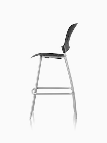 Profile view of an armless black Caper Stacking Stool.