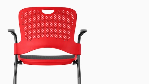 Red Caper Stacking Stool with a black suspension seat, viewed from the rear.