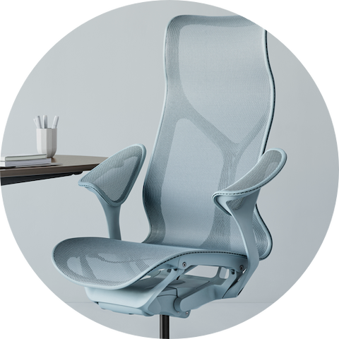 Cosm high-back chair in light blue at a table.