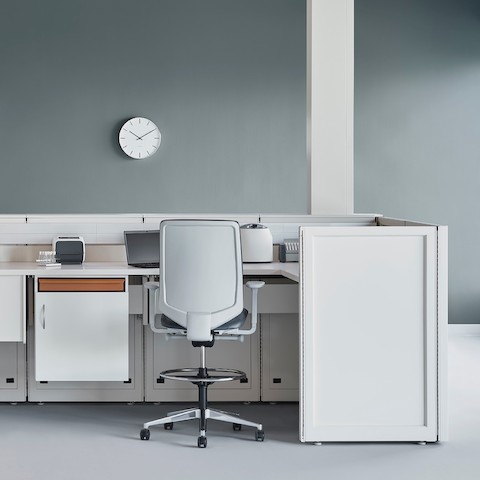 Soft white Co/Struc System with below surface storage and a gray Verus stool in a medical laboratory.