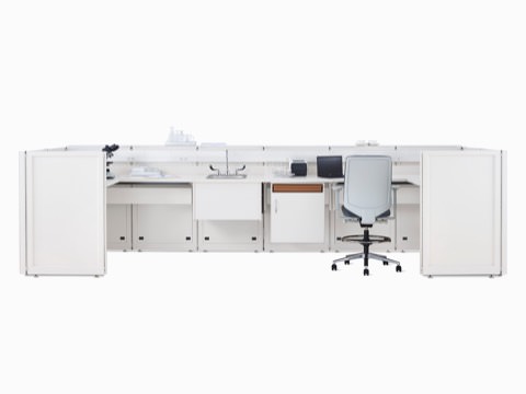 Co/Struc System laboratory bench in soft white with under surface storage, sink, and Verus Stool in light gray.