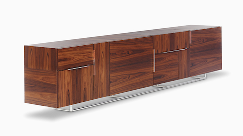 Angled view of a Domino Storage credenza consisting of eight storage modules. 