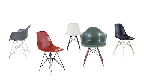 A family of Eames Molded Fiberglass Chairs in a variety of colors.