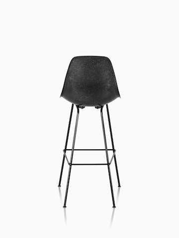 Black Eames Molded Fiberglass Stool, viewed from the rear. 