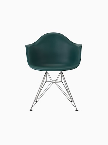 Light blue Eames Molded Plastic armchair with dowel legs, viewed from the front.