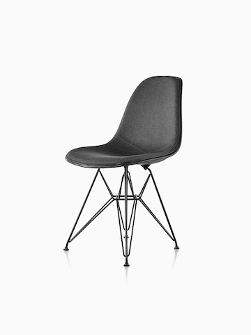Black upholstered Eames Molded Plastic side chair with a wire base, viewed from a 45-degree angle.