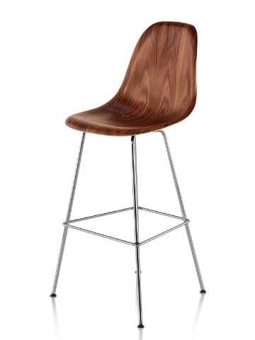 Eames Molded Wood Stool with a dark finish and silver legs, viewed from a 45-degree angle. 