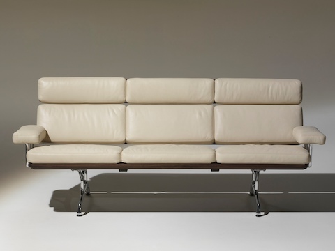 Ivory-colored Eames Sofa, viewed from the front. 
