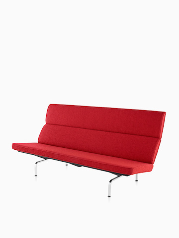 Red Eames Sofa Compact. Select to go to the Eames Sofa Compact product page. 