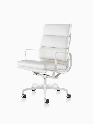 White leather Eames Soft Pad high-back executive chair, viewed from a 45-degree angle.