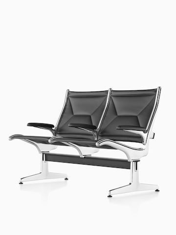 Black Eames Tandem Sling Seating. Select to go to the Eames Tandem Sling Seating product page.