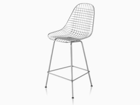 Upper half of a silver Eames Wire Stool., viewed from a 45-degree angle. 