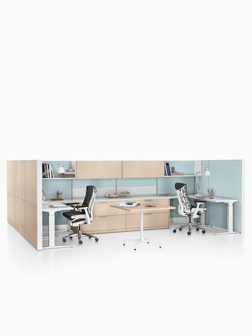 Two Ethospace System workstations with sit-to-stand desks and Embody office chairs. Select to go to the Ethospace product page.