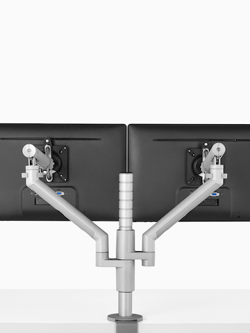 A single-post Flo Monitor Arm capable of supporting up to four monitors or laptops. Select to go to the Flo Modular product page.
