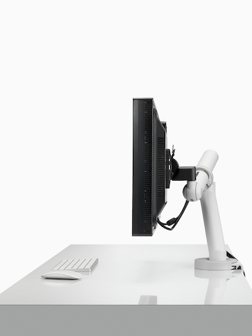 A single monitor supported by a heavy-duty version of the Flo Monitor Arm.