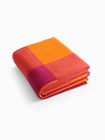 A folded throw blanket. Select to go to the Girard Throw product page.
