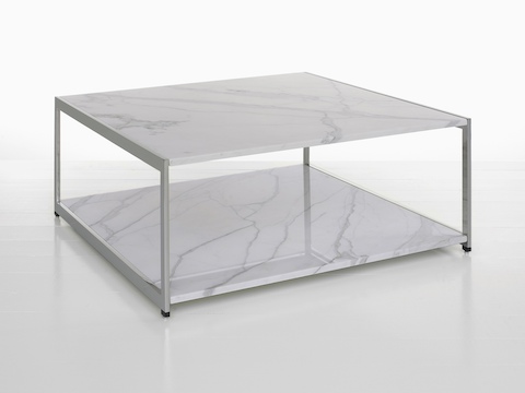 A rectangular H Frame coffee table with two stone tiers.