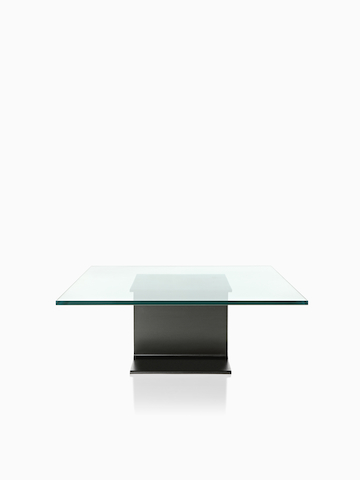 A square I Beam Table with a glass top.