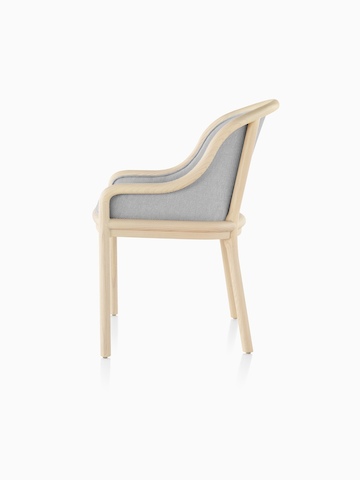 Landmark Chair with light gray upholstery and a light wood finish, viewed from the side.