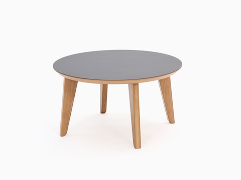 A round dark gray Dalby Coffee Table, viewed at an angle.