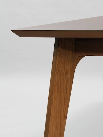 A close-up detail view of the polished MDF edge and reverse chamfer of a NaughtOne Dalby Conference Table.
