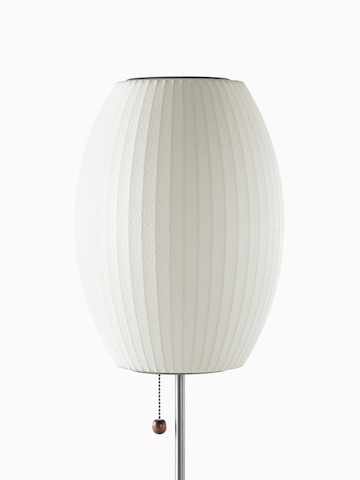 Una lámpara de mesa blanca. Seleccione para ir a la página del producto Nelson Cigar Lotus Table  Lamp.