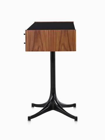 Side view of a horizontal Nelson Miniature Chest with a medium finish, black top, and black pedestal base. 