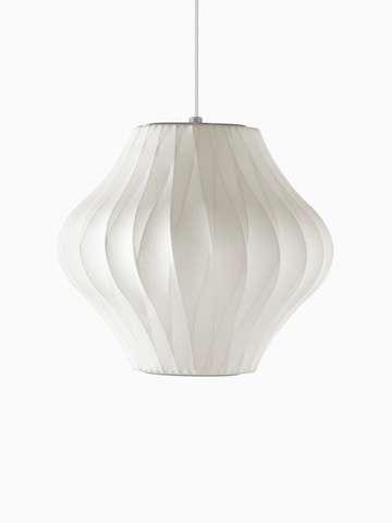 A white hanging lamp. Select to go to the Nelson Pear CrissCross Bubble Pendant product page.