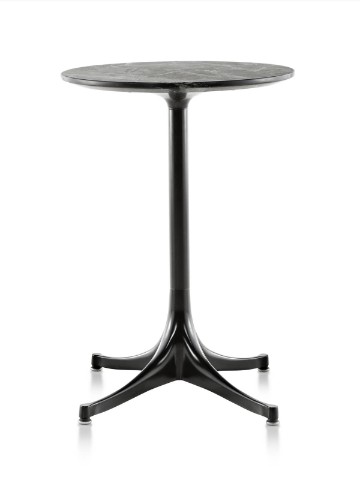 A round Nelson Pedestal outdoor side table with a black stone top and black base. 