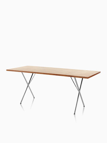Una mesa Nelson X-Leg rectangular con una parte superior de chapa media. Seleccione para ir a la página del producto Nelson X-Leg Table.