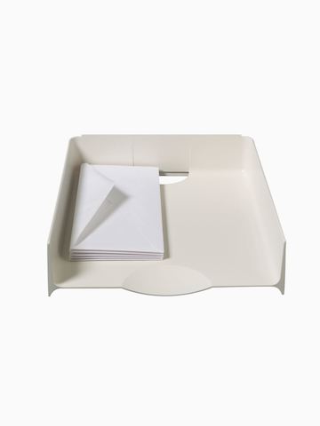 A putty-colored Paper Tray. Select to go to the Paper Tray product page.