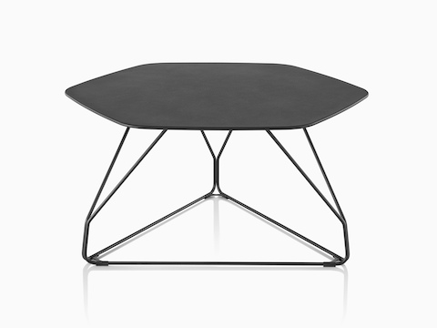 A black Polygon Wire occasional table with a hexagonal top. 