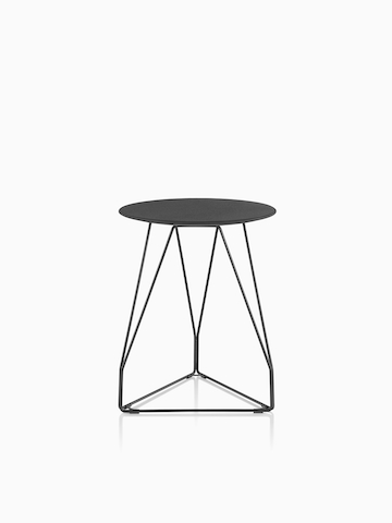 A round Polygon Wire Table with a black top.