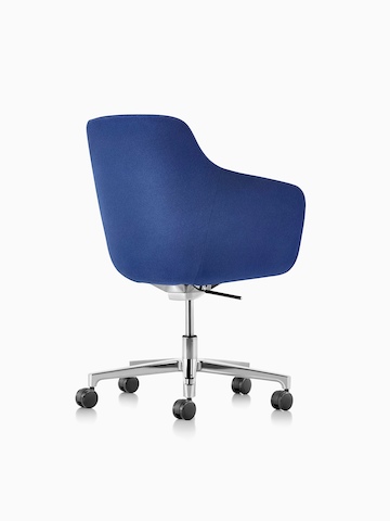 Three-quarter rear view of a mid-back Saiba executive chair in blue fabric with a polished five-star base and casters.