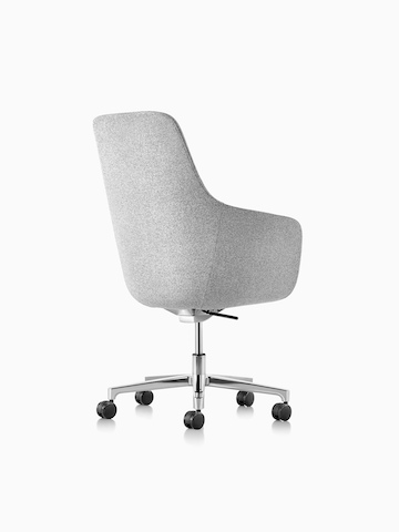 Three-quarter rear view of a high-back Saiba executive chair in light gray fabric with a polished five-star base and casters.