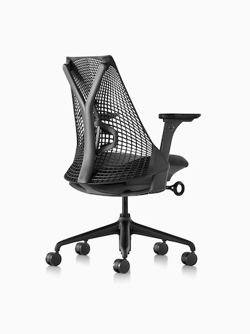 Three-quarters rear view of a black Sayl office chair with a suspension back.