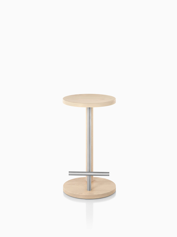 Spot Stool with a light wood finish.