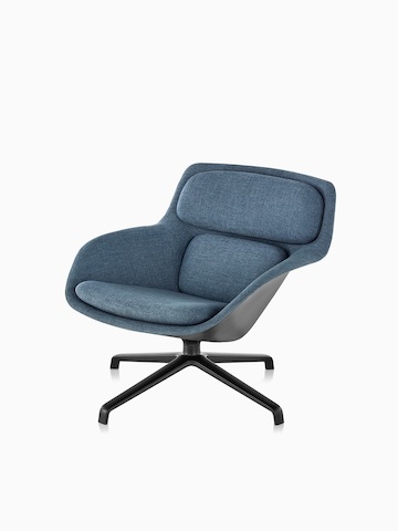 Three-quarter view of a low-back Striad Lounge Chair in blue upholstery with four-star base.  