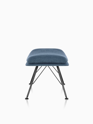 Side view of Striad Ottoman in blue upholstery with wire base.  