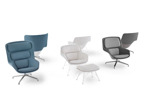 A group of Striad Lounge Chairs with matching Otomans in a variety of heights and upholstery textiles. 