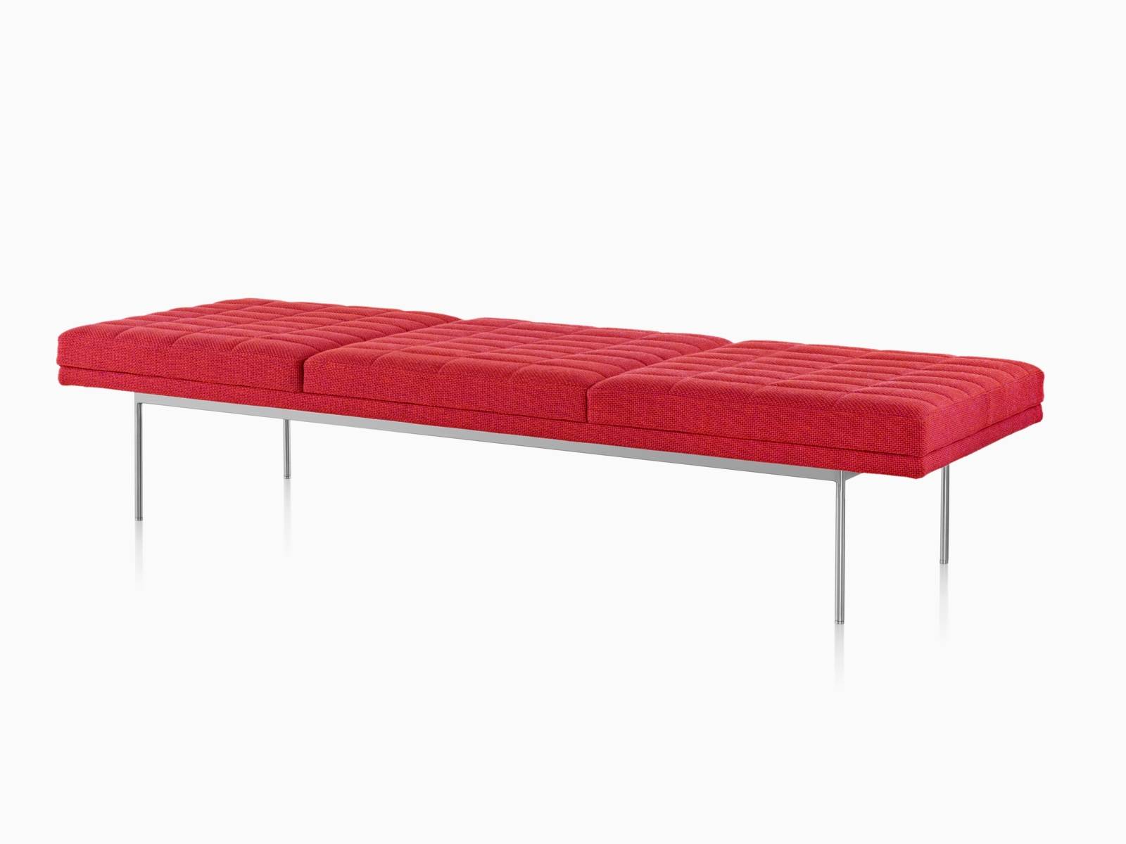 Red Tuxedo Bench with quilted upholstery bright chrome base, viewed from the front at an angle.