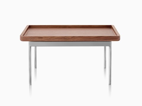 A rectangular Tuxedo Component Table with a wood top and metal base.